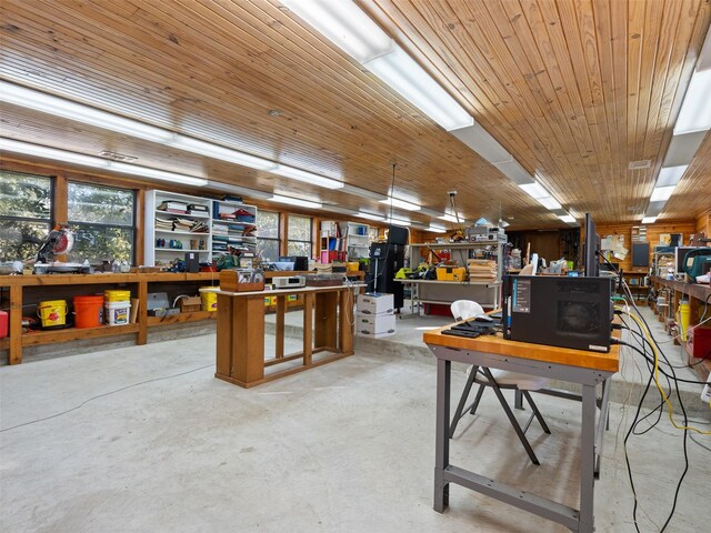 misc room with a workshop area and wood ceiling