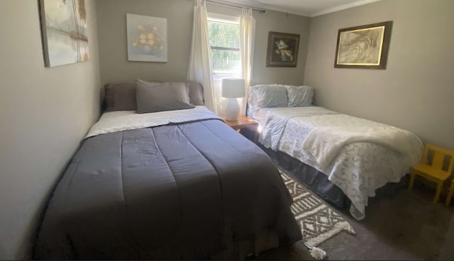 bedroom featuring crown molding