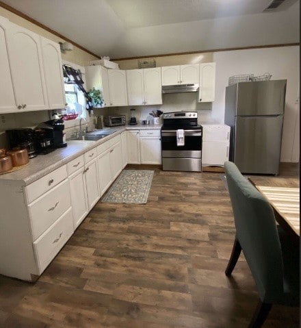 kitchen featuring white cabinetry, appliances with stainless steel finishes, and sink