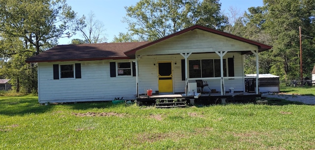 bungalow-style house with a porch and a front yard