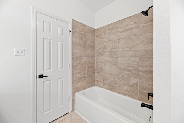 bathroom featuring tiled shower / bath combo and tile patterned floors