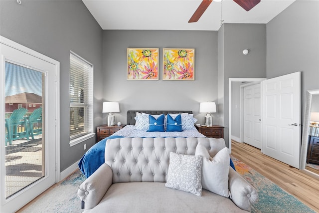 bedroom featuring hardwood / wood-style flooring and ceiling fan