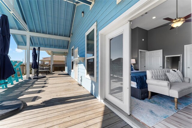 2423 Sandpiper, Crystal Beach, TX 77650 - wooden terrace with a ceiling fan