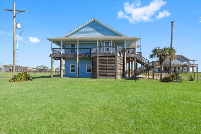 2423 Sandpiper, Crystal Beach, TX 77650 - rear view of house with stairs