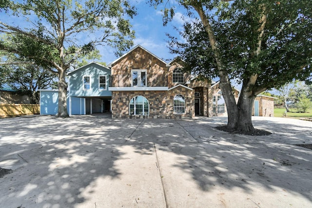 view of property featuring a balcony