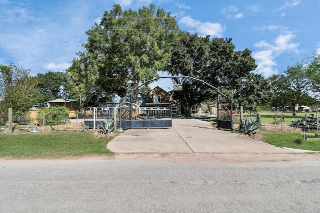 view of front of home with a gate and fence