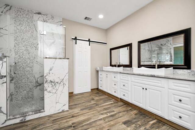 bathroom with vanity and walk in shower