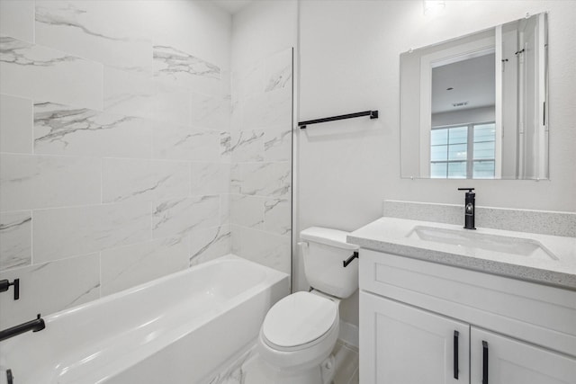 full bathroom with toilet, tiled shower / bath combo, and vanity