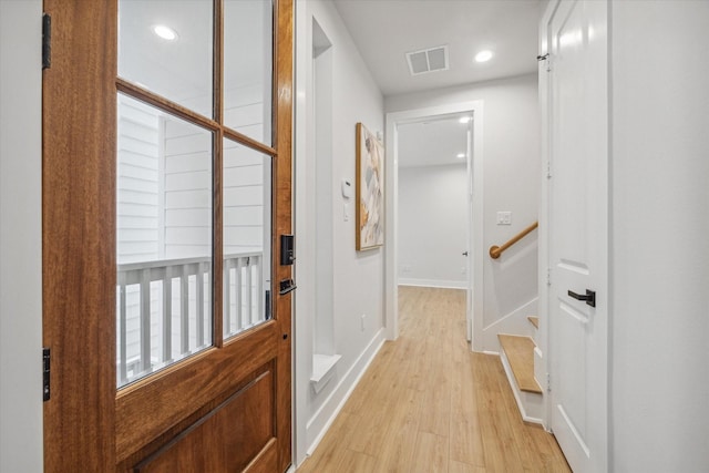 doorway featuring light hardwood / wood-style flooring