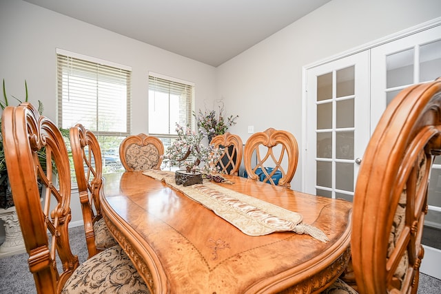 dining room with carpet flooring and french doors