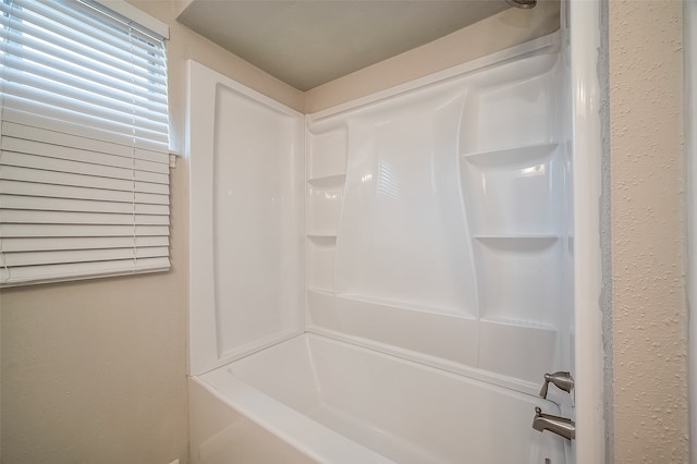 bathroom featuring tub / shower combination