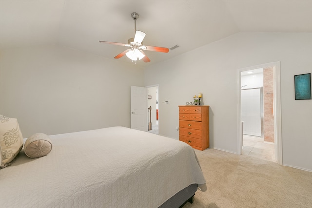 carpeted bedroom featuring ceiling fan, connected bathroom, and lofted ceiling