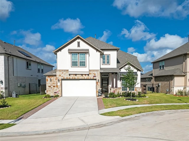 view of front of property with a garage and a front yard