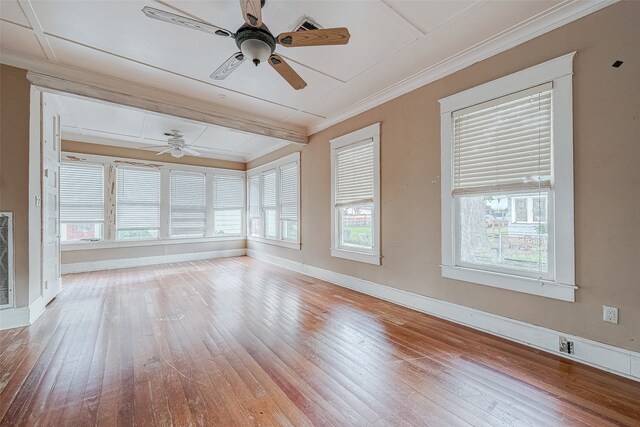 interior space with ceiling fan