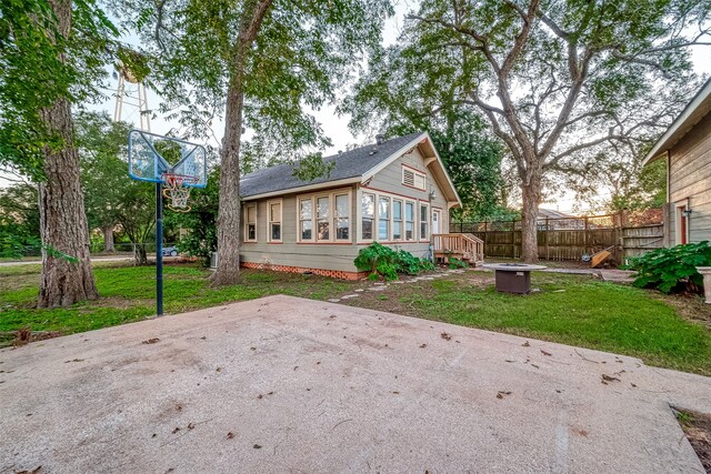 exterior space featuring a patio area and a yard