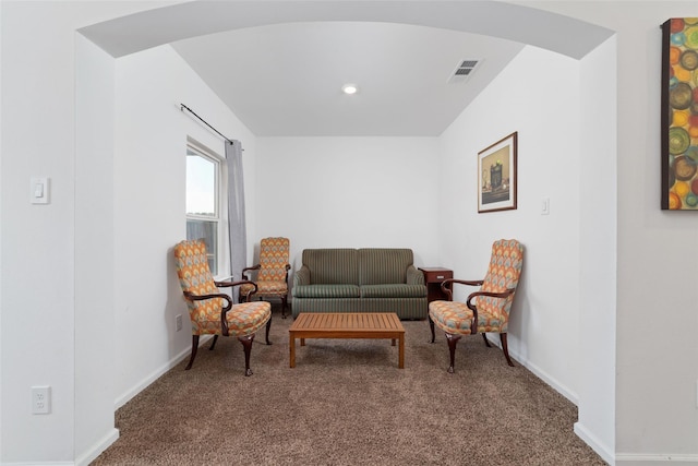 12712 Plummersville St, Houston, TX 77072 - sitting room with arched walkways, carpet floors, and baseboards