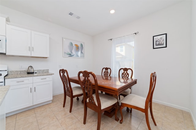 view of tiled dining area