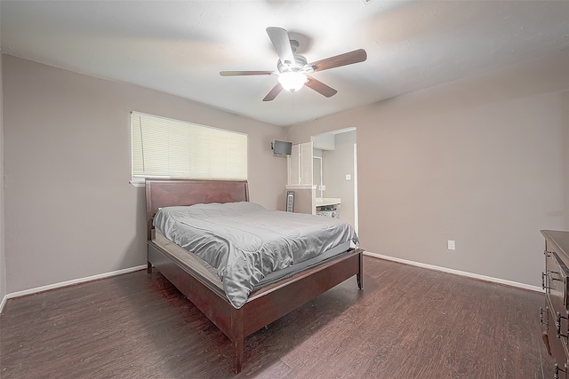 bedroom featuring dark wood-type flooring and ceiling fan