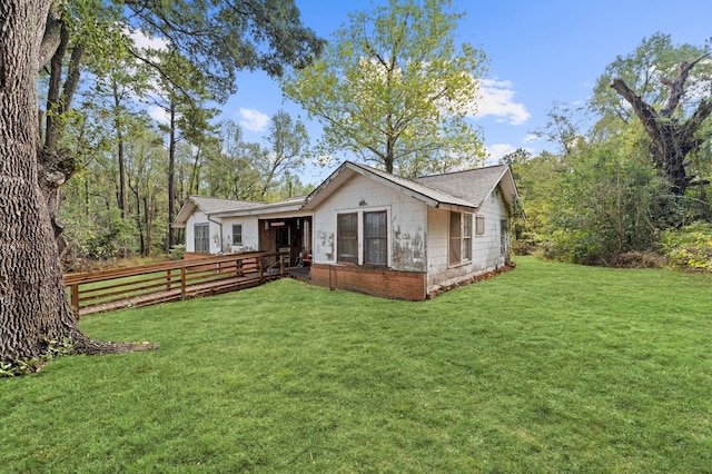 view of front of home with a front yard