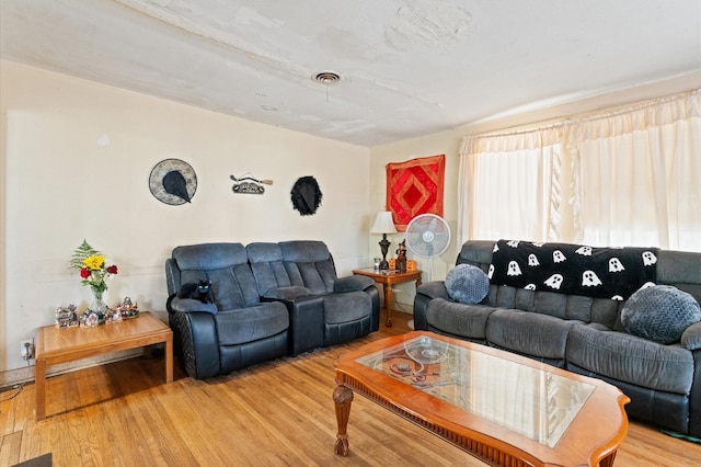 living room with hardwood / wood-style flooring