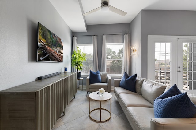 living room with light tile patterned flooring and ceiling fan