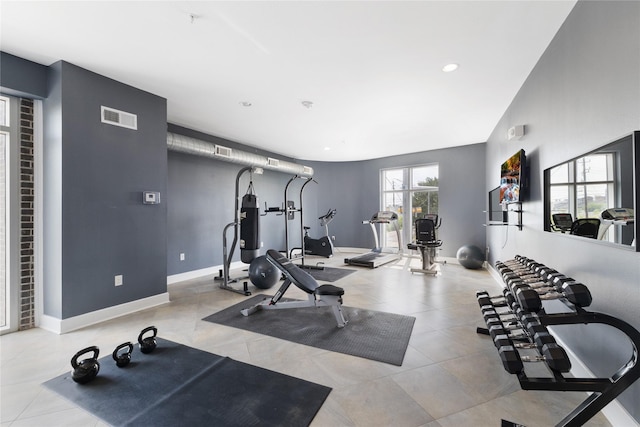 1011 Studemont St Unit 101, Houston, TX 77007 - exercise room with baseboards and recessed lighting