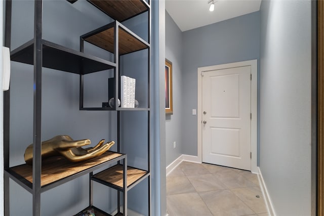 interior space featuring light tile patterned floors