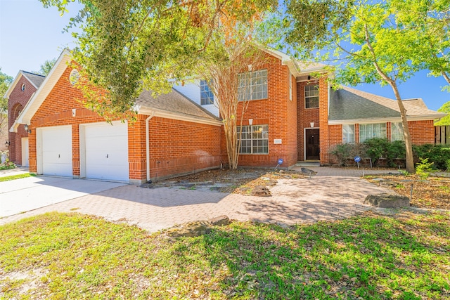 front of property with a garage