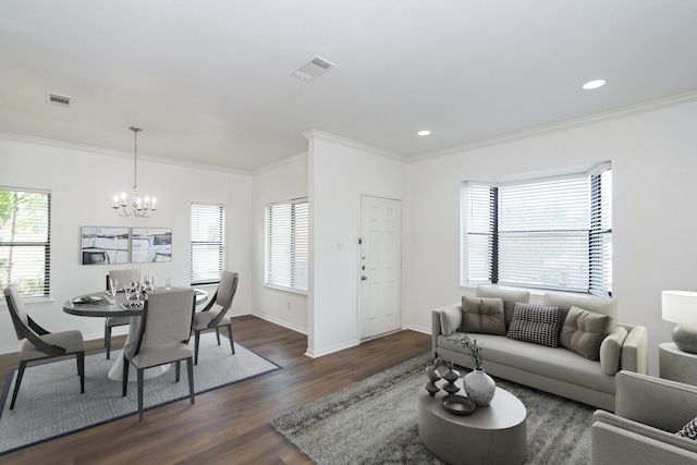 living room with dark wood-type flooring, a wealth of natural light, and ornamental molding