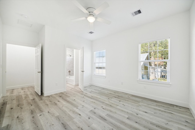 unfurnished bedroom with light hardwood / wood-style flooring and ceiling fan