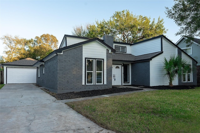 view of front of home with a shingled roof, a chimney, and a front lawn