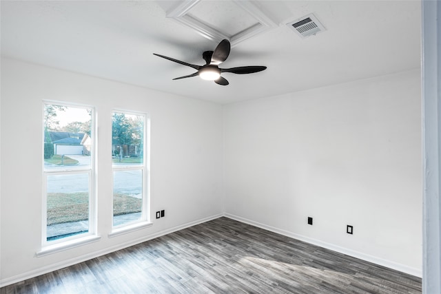 spare room with ceiling fan and dark hardwood / wood-style flooring