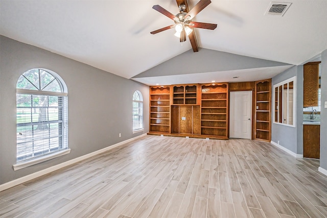 unfurnished living room featuring light hardwood / wood-style floors, ceiling fan, sink, and lofted ceiling with beams