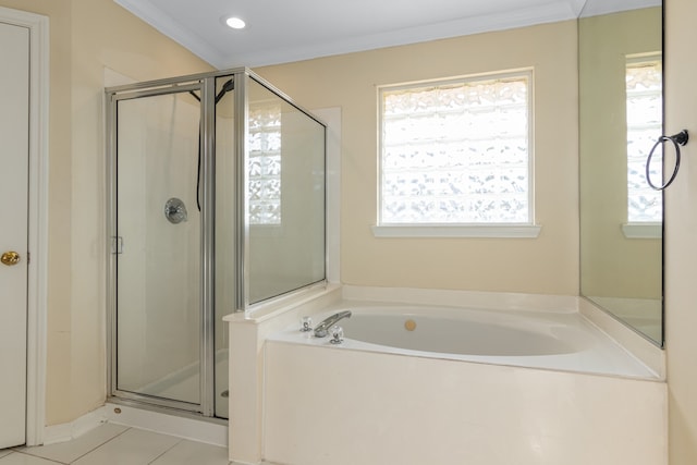 bathroom featuring ornamental molding, shower with separate bathtub, and tile patterned floors