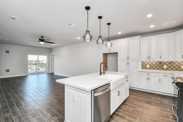 6804 Westview Dr Unit 3405, Houston, TX 77055 - kitchen with appliances with stainless steel finishes, a sink, recessed lighting, dark wood finished floors, and ceiling fan
