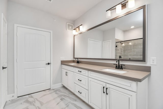 6804 Westview Dr Unit 3405, Houston, TX 77055 - bathroom featuring double vanity, a tile shower, and marble look tiles