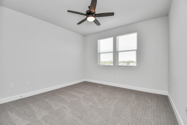 6804 Westview Dr Unit 3405, Houston, TX 77055 - spare room with dark carpet, baseboards, and a ceiling fan
