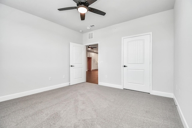 6804 Westview Dr Unit 3405, Houston, TX 77055 - unfurnished bedroom with carpet, baseboards, and a ceiling fan