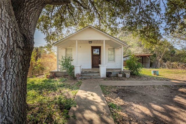 bungalow-style home featuring a porch