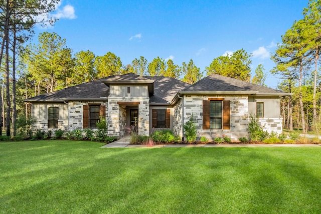 prairie-style house featuring a front yard