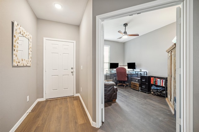 interior space with hardwood / wood-style floors and ceiling fan