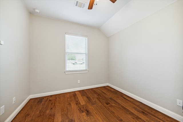 unfurnished room with ceiling fan, hardwood / wood-style floors, and vaulted ceiling