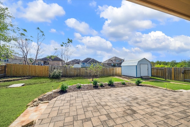 view of patio featuring a storage unit