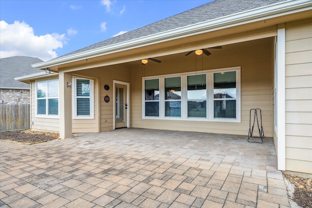 exterior space featuring ceiling fan and a patio