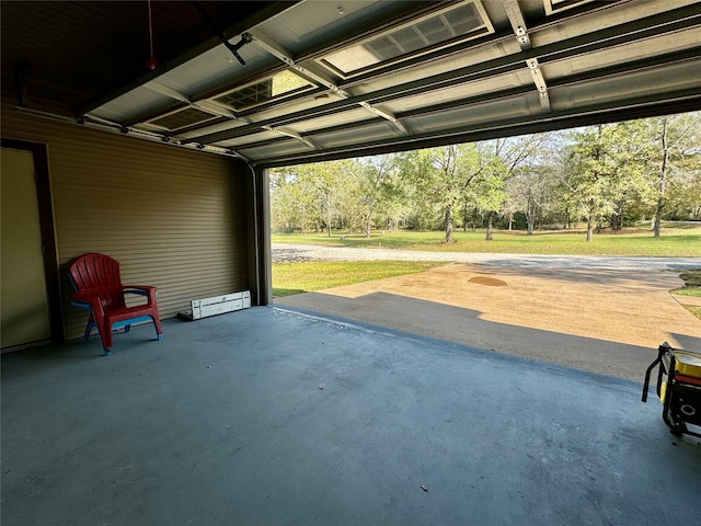 garage featuring a yard