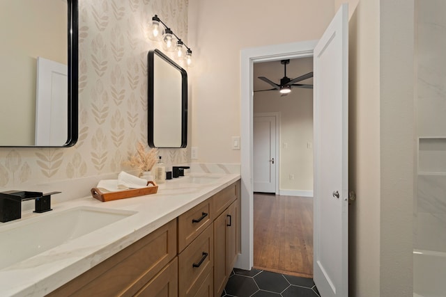 bathroom featuring vanity, hardwood / wood-style flooring, and ceiling fan