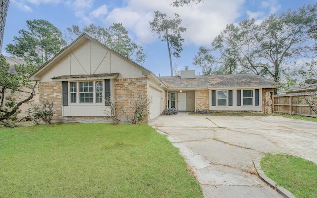 2046 Lexington Woods Dr, Spring, TX 77373 - view of front of property featuring driveway, brick siding, and an attached garage