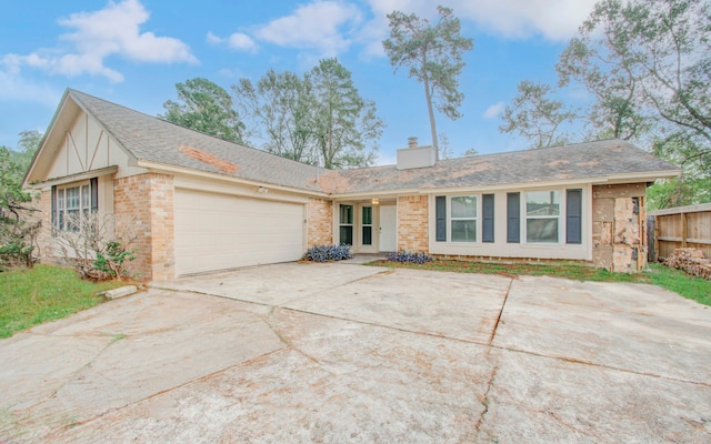 ranch-style home with a garage