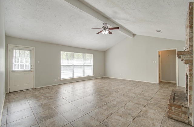 2046 Lexington Woods Dr, Spring, TX 77373 - unfurnished living room featuring ceiling fan, a textured ceiling, light tile patterned floors, and baseboards
