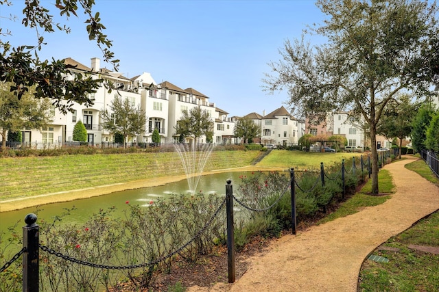 view of property's community featuring a water view